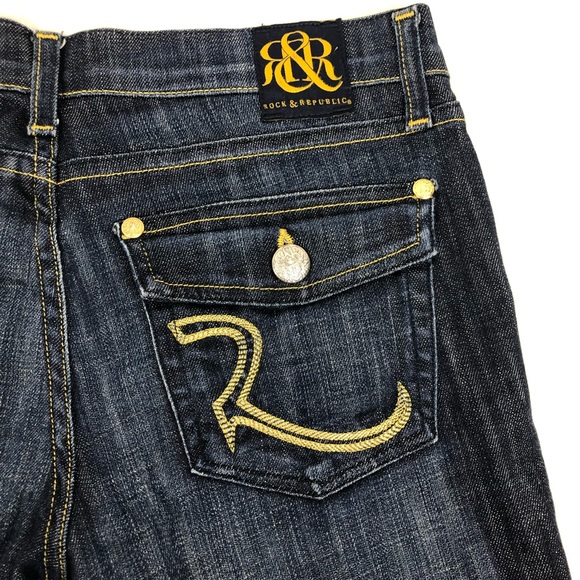 dark blue jeans with gold stitching